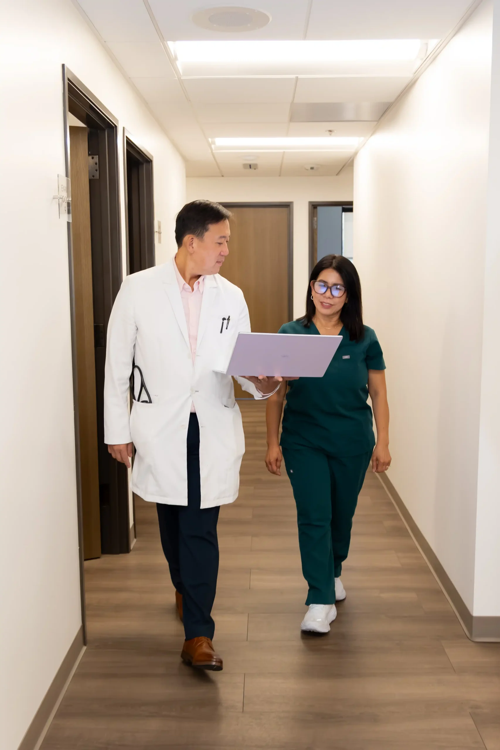 Dr. Ho and a staff member.