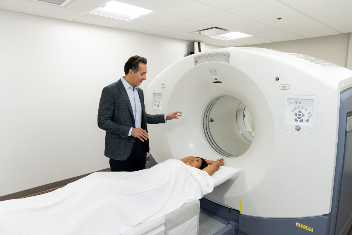 Dr. Shaye with a patient at the Wellness Imaging Center PET/CT scanner